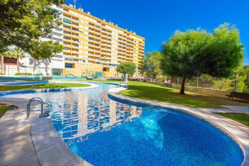 Apartment In Campoamor Overlooking The Swimming Pool Экстерьер фото