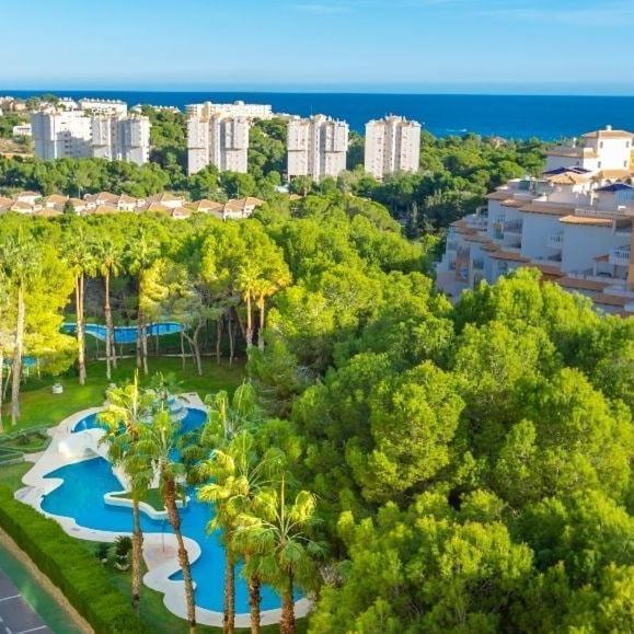 Apartment In Campoamor Overlooking The Swimming Pool Экстерьер фото