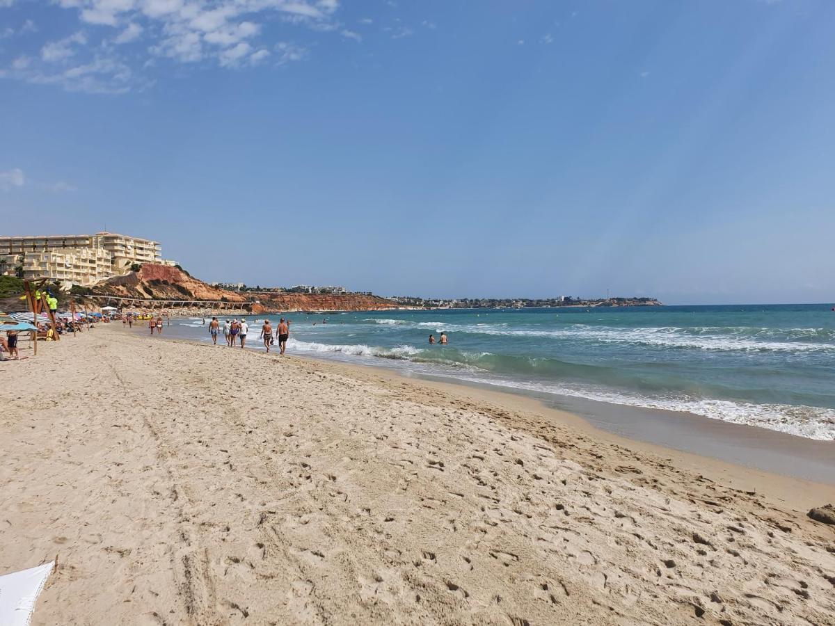 Apartment In Campoamor Overlooking The Swimming Pool Экстерьер фото