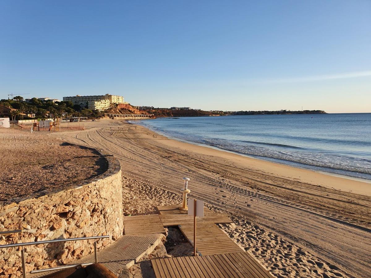 Apartment In Campoamor Overlooking The Swimming Pool Экстерьер фото