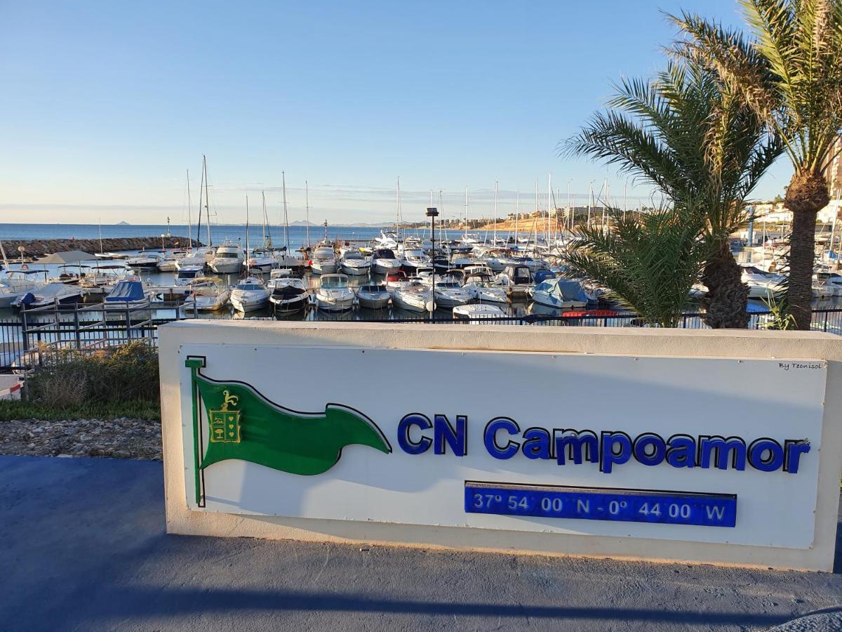 Apartment In Campoamor Overlooking The Swimming Pool Экстерьер фото